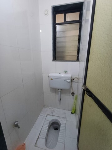 Bathroom in 1 BHK Apartment at Ek Siddhi CHS Kolbad Road, Khopat – for Sale