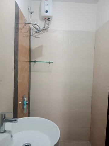 Bathroom in 2 BHK Apartment at Raunak Paradise, Kokanipada – for Sale