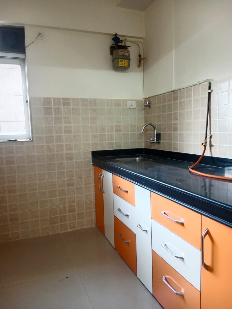 Kitchen, raunak-paradise 2 Bedroom 980 Sq.Ft. Apartment In Kokanipada Thane 7832509