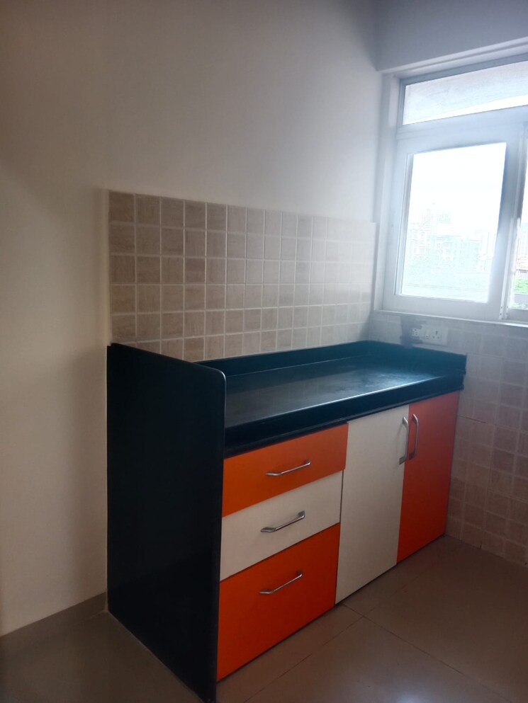 Kitchen, raunak-paradise 2 Bedroom 980 Sq.Ft. Apartment In Kokanipada Thane 7832509