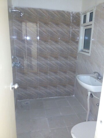 Bathroom in 2 BHK Apartment at Antriksh Golf View, Sector 78 – for Rent