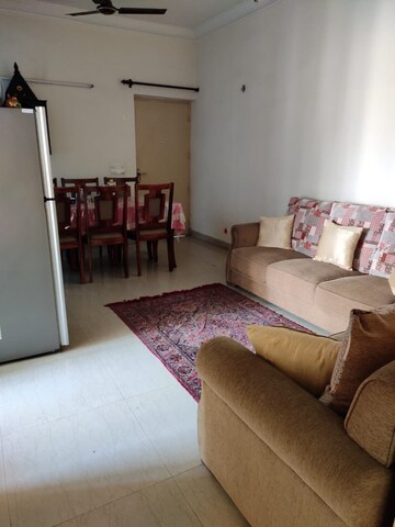 Living Room in 2 BHK Apartment at Antriksh Golf View, Sector 78 – for Rent