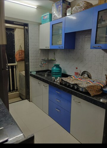 Kitchen in 1 BHK Apartment at Heena Presidency, Mira Road – for Sale