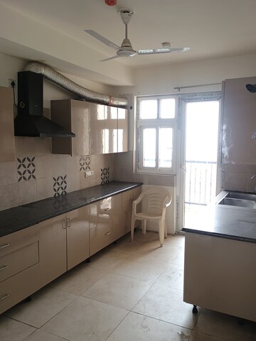 Kitchen in 4 BHK Apartment at ATS Triumph, Sector 104 – for Sale