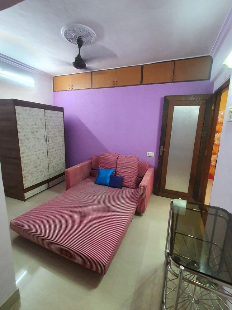 Living Room, parijat-chs-andheri-west 2 Bedroom 650 Sq.Ft. Apartment In Yari Road Mumbai 7834175