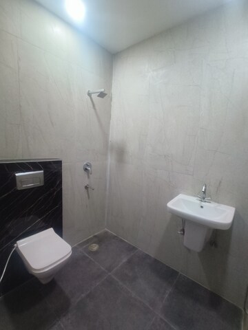 Bathroom in 3 BHK Apartment at Motia Blue Ridge, Dhakoli Village – for Sale