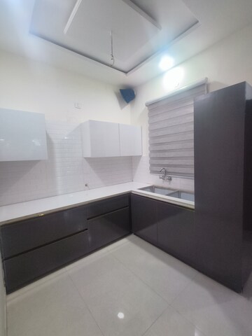Kitchen in 3 BHK Apartment at Motia Blue Ridge, Dhakoli Village – for Sale
