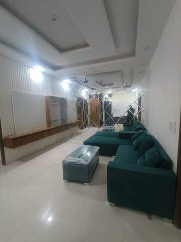Living Room in 3 BHK Apartment at Motia Blue Ridge, Dhakoli Village – for Sale