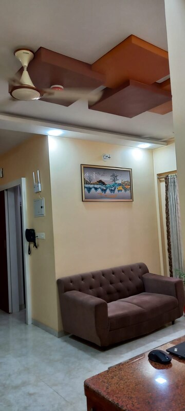 Living Room in 1 BHK Apartment at Lodha Amara, Kolshet Road – for Sale