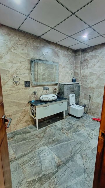 Bathroom in 5 BHK Builder Floor at Niti Khand – for Sale