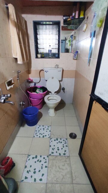 Bathroom in 2 BHK Apartment at Seawoods – for Sale