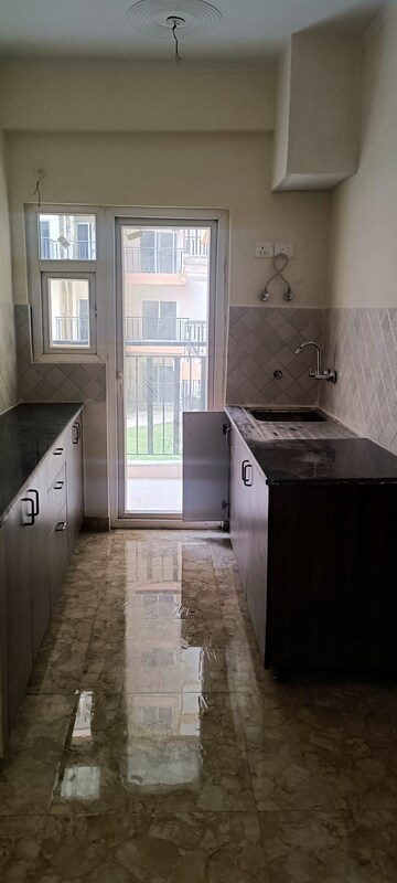Kitchen in 3 BHK Apartment at Amrapali Terrace Homes, Tech Zone 4 Greater Noida – for Sale
