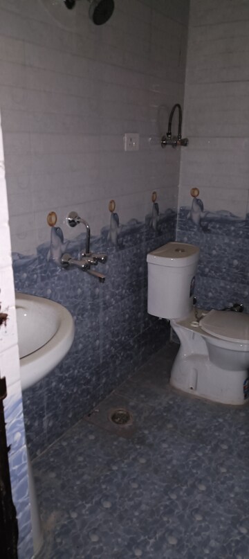 Bathroom in 2 BHK Apartment at Shyam Bankey Bihari Sharnam, Raj Nagar Extension – for Sale