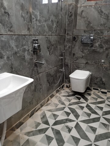 Bathroom in 3 BHK Apartment at Mahavir Enclave 1 – for Sale