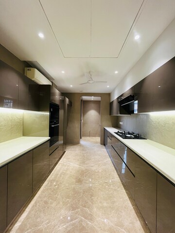 Kitchen in 4 BHK Builder Floor at Suncity Heights, Sector 54 – for Sale