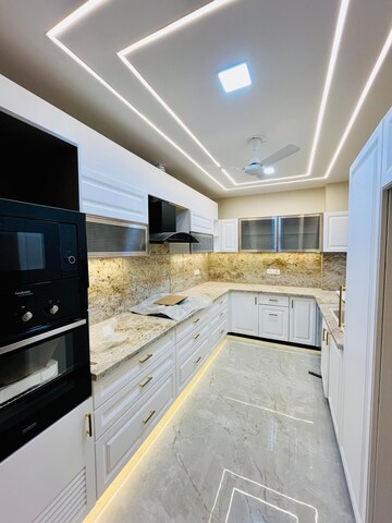 Kitchen in 4 BHK Builder Floor at Ansal API Esencia, Sector 67 – for Sale