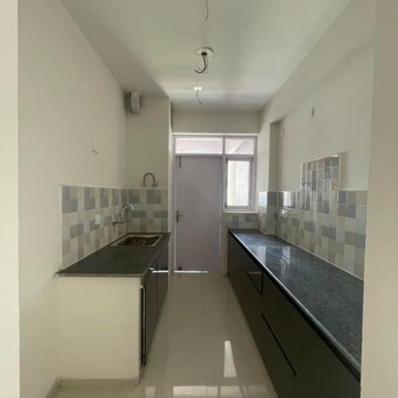 Kitchen in 3 BHK Apartment at Cosmos Express 99, Gopalpur – for Sale