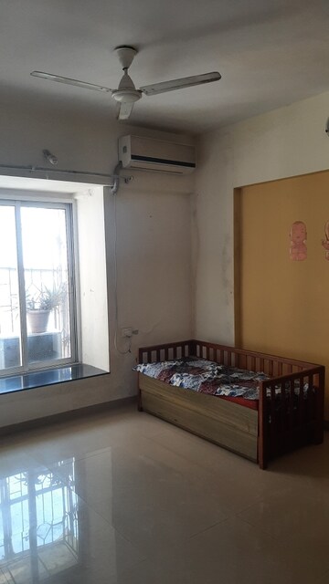 Bedroom in 2 BHK Apartment at New Mahada Colony, Goregaon East – for Sale