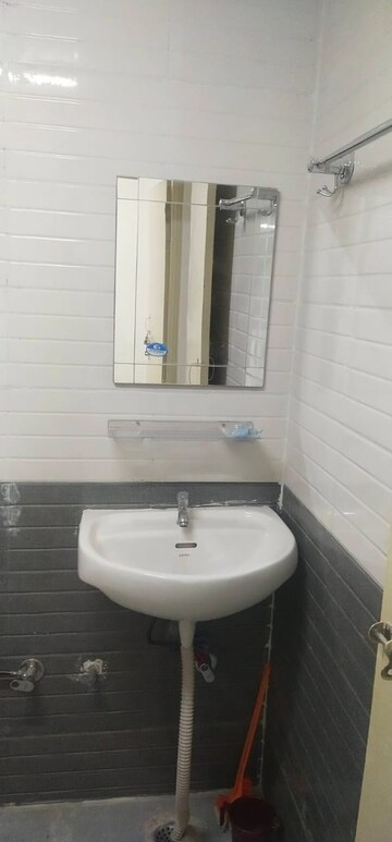 Bathroom in 2 BHK Apartment at Signature Orchard Avenue 2, Sector 93 – for Sale