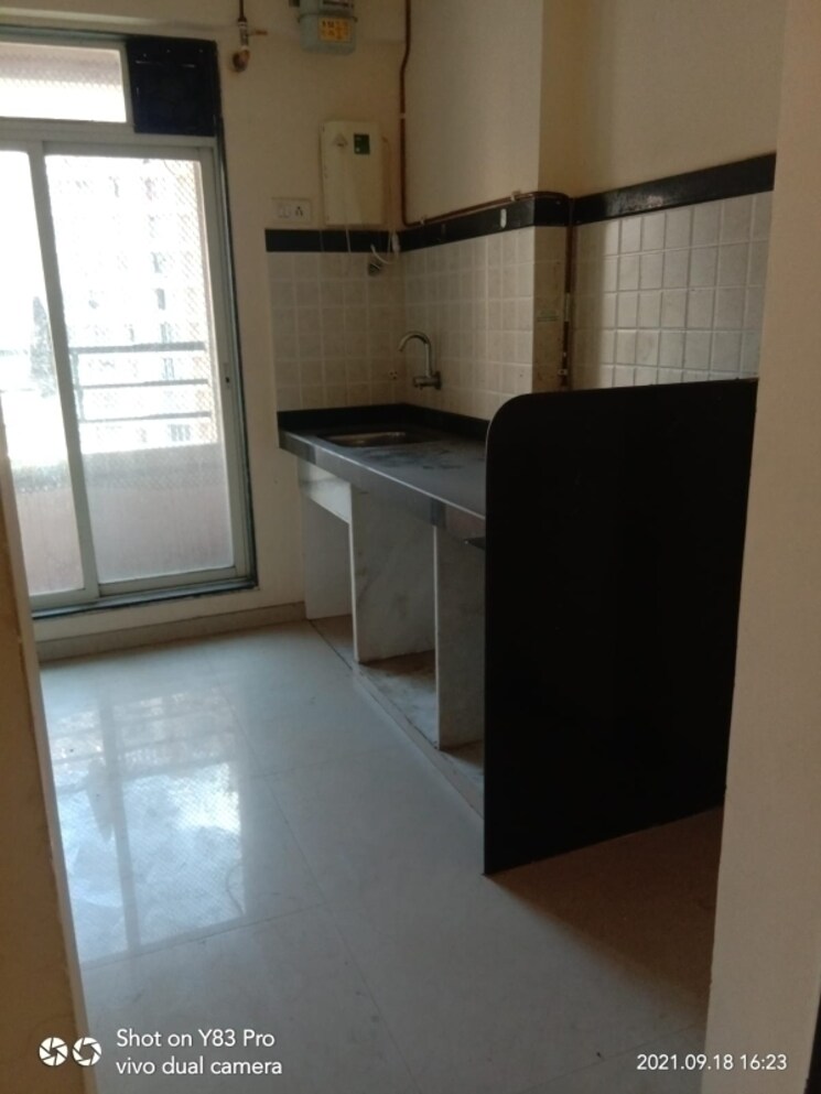 Kitchen, puraniks-one-hometown 2 Bedroom 1108 Sq.Ft. Apartment In Ghodbunder Road Thane 7842390