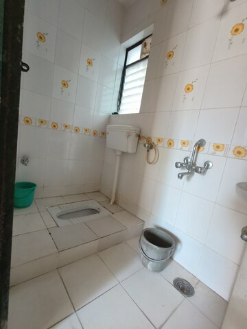 Bathroom in 2 BHK Apartment at Ramkrishna Paradise, Dhayari – for Sale