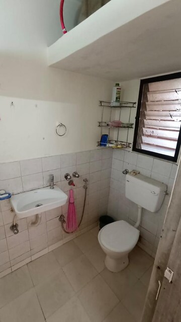 Bathroom in 2 BHK Apartment at Raunak Unnathi Woods Phase 4 And 5, Ghodbunder Road – for Sale