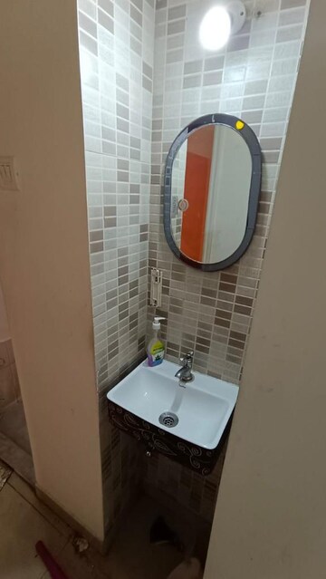 Bathroom in 2 BHK Apartment at Raunak Unnathi Woods Phase 4 And 5, Ghodbunder Road – for Sale