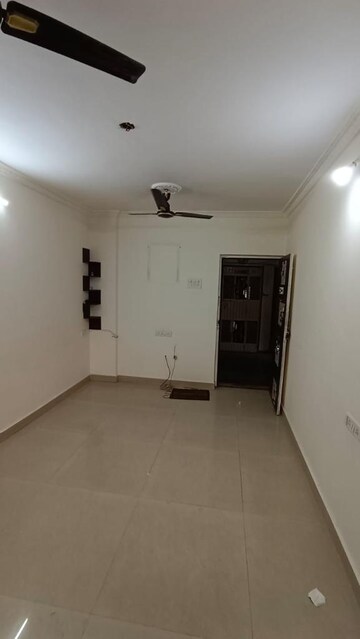 Living Room in 2 BHK Apartment at Raunak Unnathi Woods Phase 4 And 5, Ghodbunder Road – for Sale