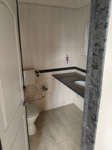 Bathroom in 3 BHK Apartment at Unique Twins Tower CHS, Sector 20 Kharghar – for Sale