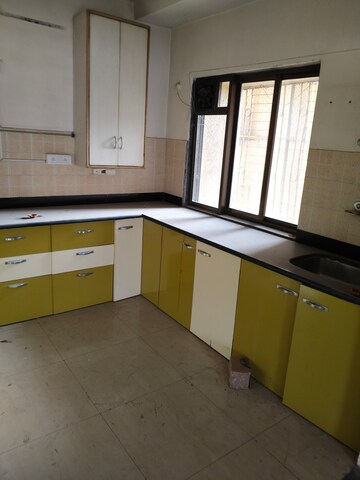 Kitchen in 3 BHK Apartment at Unique Twins Tower CHS, Sector 20 Kharghar – for Sale