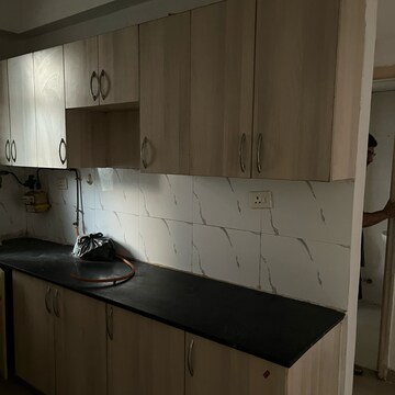 Kitchen in 2.5 BHK Apartment at Supertech Crown Town, Sector 74 – for Sale