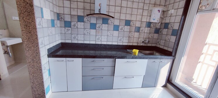 Kitchen, paradise-sai-world-city-phase-2 2 Bedroom 850 Sq.Ft. Apartment In New Panvel Navi Mumbai 7844680