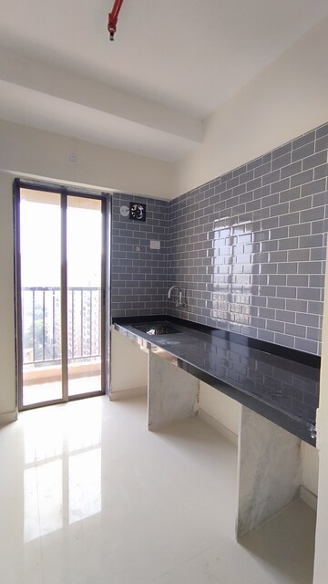 Kitchen in 1 BHK Apartment at Raunak City, Kalyan West – for Sale