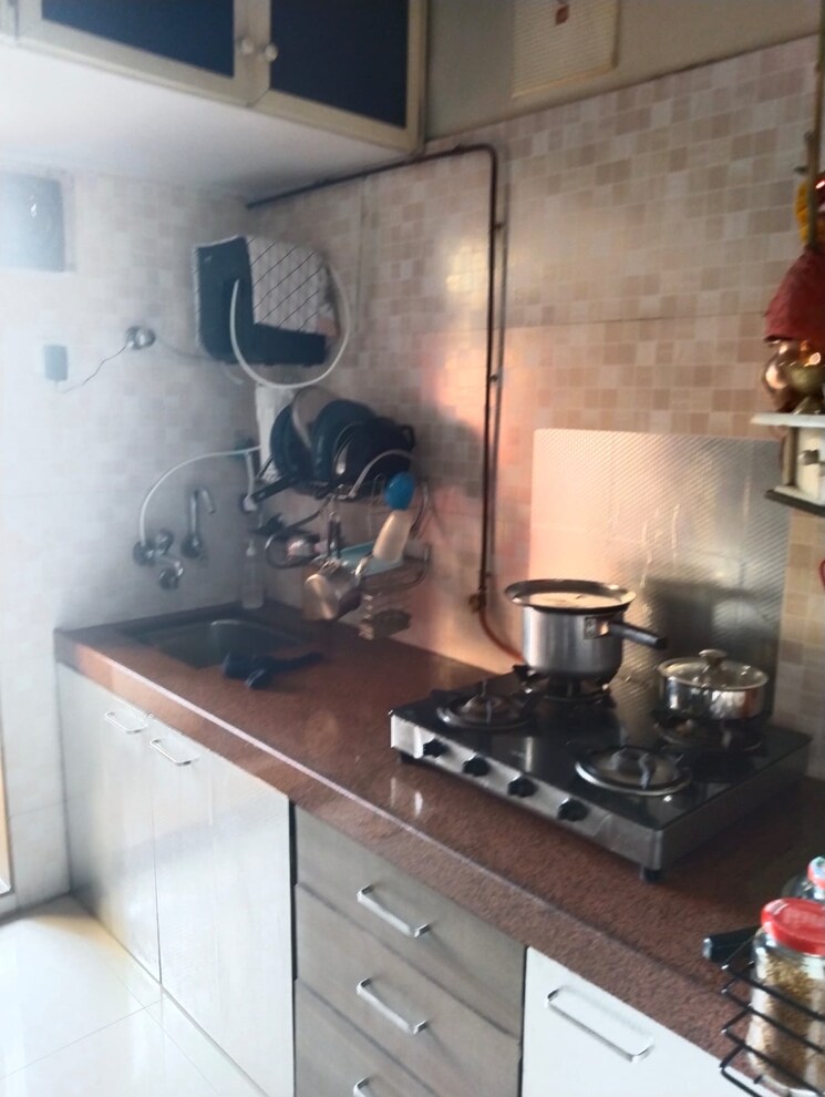 Kitchen, kanakia-iraisa-apartments 2 Bedroom 700 Sq.Ft. Apartment In Mira Road Thane 7844902