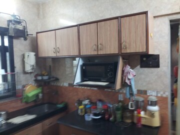 Kitchen in 2 BHK Apartment at The Kamal Sagar CHS, Bhandup East – for Sale