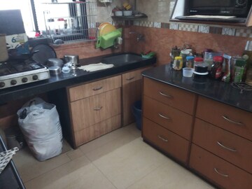 Kitchen in 2 BHK Apartment at The Kamal Sagar CHS, Bhandup East – for Sale