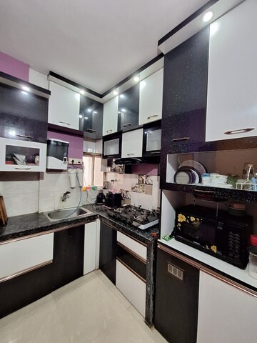 Kitchen in 3 BHK Apartment at Magnolia Prestige, Bishnupur – for Sale