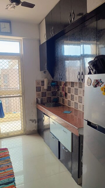 Kitchen in 2 BHK Apartment at JKG Palm Resort, Raj Nagar Extension – for Sale