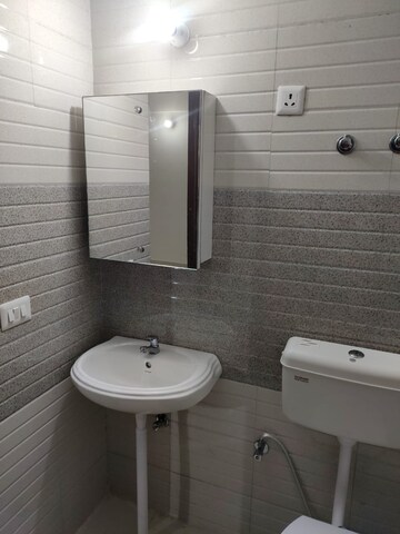 Bathroom in 2 BHK Apartment at Signature Global Orchard Avenue, Sector 93 – for Sale