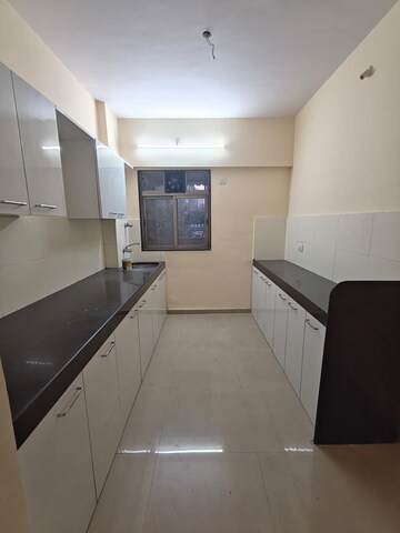 Kitchen in 2.5 BHK Apartment at Shreeji Splendor, Brahmand – for Sale