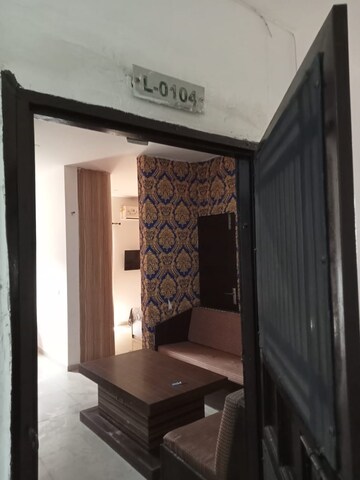 Living Room in 1 BHK Apartment at Ajnara Daffodil, Sector 137 – for Rent