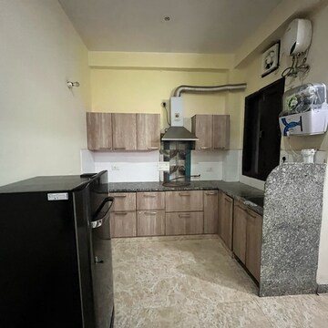 Kitchen in 2 BHK Builder Floor at Ansal Sushant Lok I, Sector 43 – for Rent