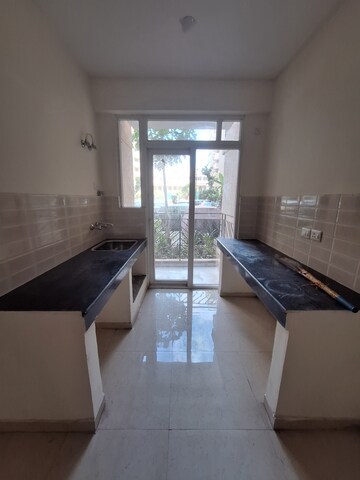 Kitchen in 2 BHK Apartment at Signature Global Grand Iva, Sector 103 – for Sale