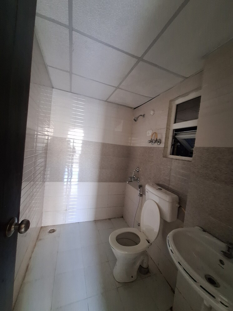 Bathroom, signature-global-grand-iva 2 Bedroom 716 Sq.Ft. Apartment In Sector 103 Gurgaon 7847430