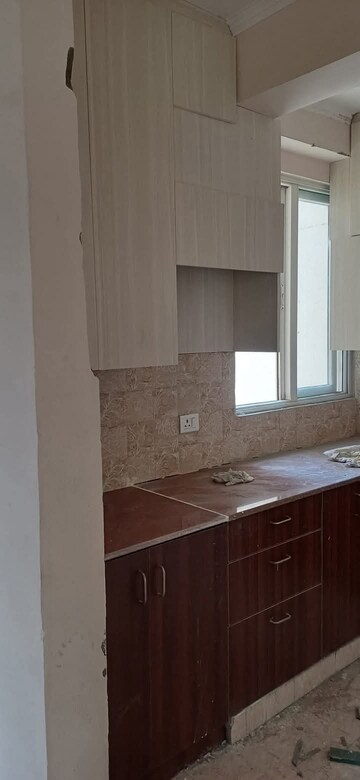 Kitchen in 2 BHK Apartment at Amrapali Leisure Park, Amrapali Leisure Valley – for Sale