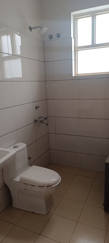 Bathroom in 3 BHK Apartment at Auric City Homes, Sector 82 – for Rent