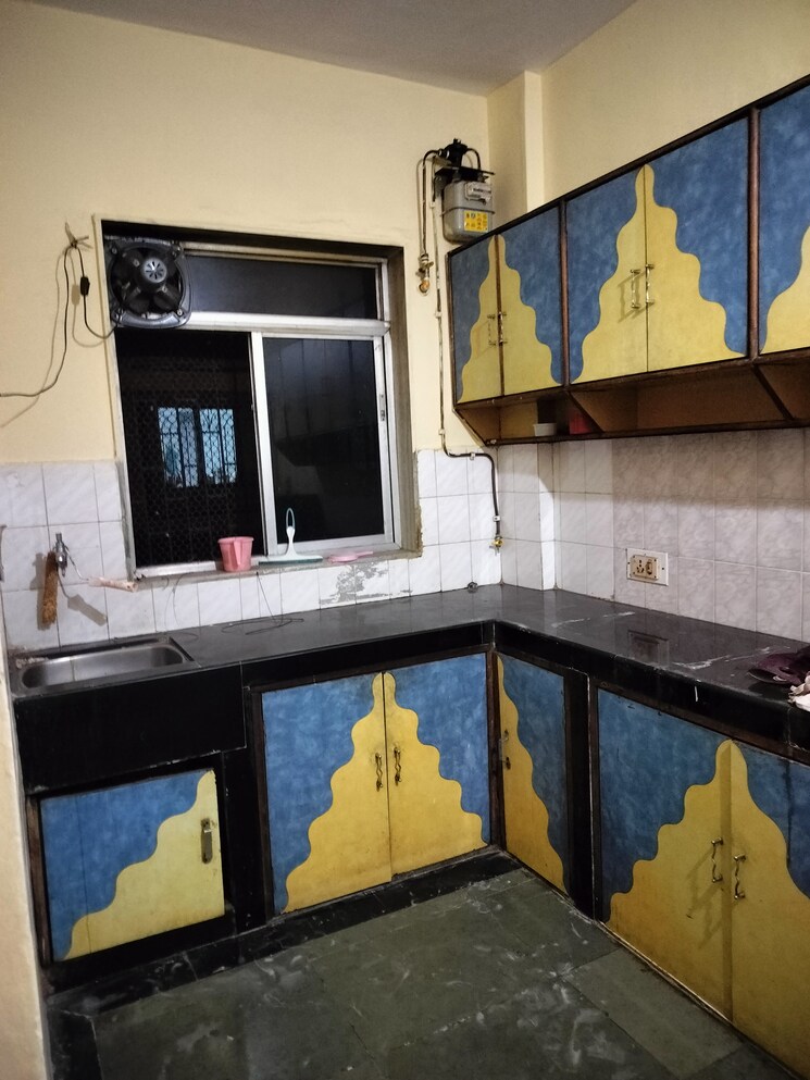 Kitchen, twin-corner 2 Bedroom 650 Sq.Ft. Apartment In Nerul Navi Mumbai 7849895