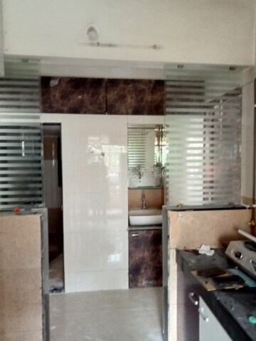 Kitchen in 1 BHK Apartment at Raj Mandir Complex, Mira Road – for Sale