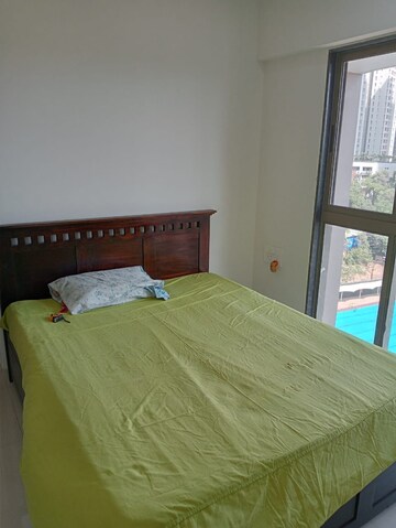 Bedroom in 2 BHK Apartment at Kalpataru Paramount, Kapur Bawdi – for Rent