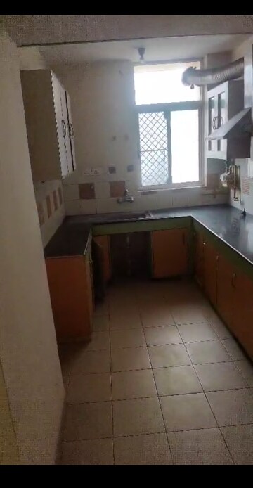 Kitchen in 2 BHK Apartment at Ashiana Palm Court, Raj Nagar Extension – for Sale